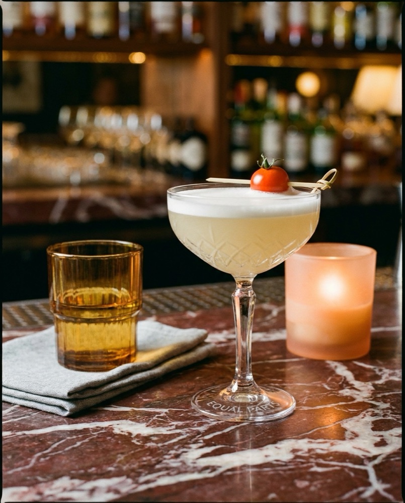 Martini and amber glass on the marble bar